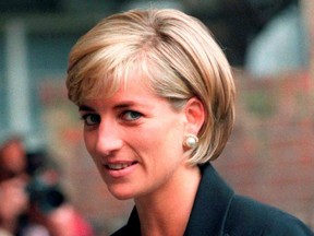 Princess Diana arrives at the Royal Geographical Society in London for a speech on the dangers of landmines throughout the world June 12, 1997.