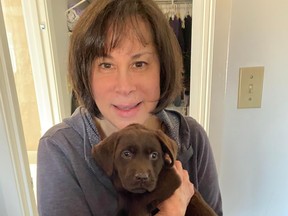 Susan Cuperfain with her new puppy Aero.
