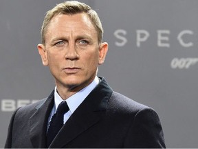 British actor Daniel Craig poses for photographers at a photocall for the new James Bond film 'Spectre' on October 28, 2015 in Berlin.