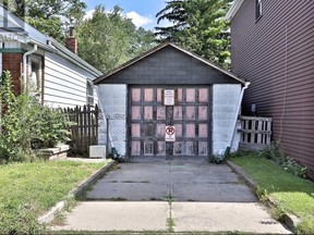 A garage property is being sold as is for $729,000 at 951B Greenwood Ave., near Sammon Ave.