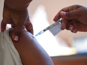 A healthcare worker receives the Johnson and Johnson coronavirus disease (COVID-19) vaccination at Khayelitsha Hospital near Cape Town, South Africa, February 17,  2021.