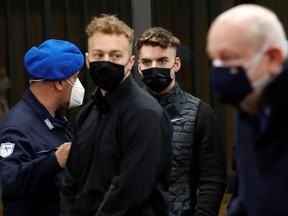 Gabriel Natale-Hjorth, right, and Finnegan Lee Elder, both from the U.S., arrive for a hearing in the trial where they are accused of slaying the Carabinieri paramilitary police officer Mario Cerciello Rega, while on vacation in Italy in July 2019, in Rome, Italy, March 6, 2021.