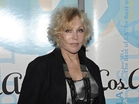 Actress Kim Novak arrives at a cocktail party for the American Cinematheque event "Platinum Career: A Tribute to Kim Novak" in Los Angeles on Friday, July 30, 2010.