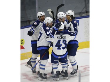 Manitoba Moose Joona Luoto LW (22) celebrates his goal. With teammates during the third period in Toronto on Monday March 1, 2021. Jack Boland/Toronto Sun/Postmedia Network