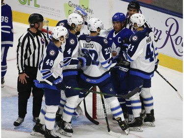 Toronto Marlies Rich Clune LW (17) in a scrum in front of the Manitoba Moose Joona Luoto LW (22) and teammate Cole Maier C (41) net during the first period in Toronto on Monday March 1, 2021. Jack Boland/Toronto Sun/Postmedia Network