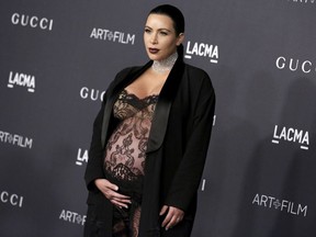 TV personality Kim Kardashian arrives at the LACMA Art + Film Gala in Los Angeles, California, November 7, 2015.