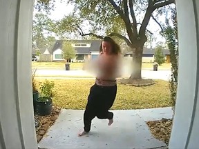 A woman is seen losing her top while stealing a package from a Houston home.