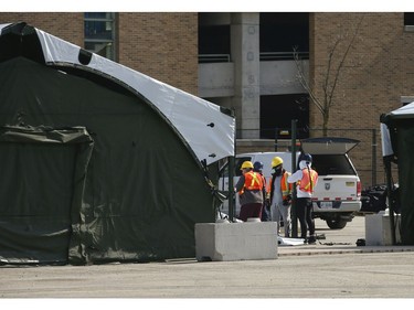 Sunnybrook Hospital's employee parking lot is being converted over into a mobile hospital unit as part of Emergency Preparedness to possible combat the "third wave" of COVID. The site will initially allow for 84 beds and treatment areas for patients that could expand to 100 on Wednesday March 10, 2021. Jack Boland/Toronto Sun/Postmedia Network