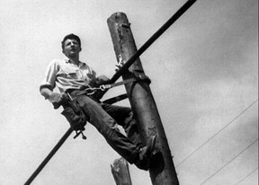 A young Walter Gretzky makes repairs atop a telephone pole near Brantford, Ont. in this 1970s photo. He was an installer and repairman for Bell Canada for 34 years before retiring in 1991.