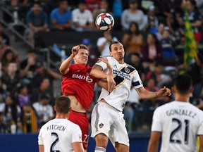 Toronto FC midfielder Liam Fraser (left) has been loaned out to Columbus.