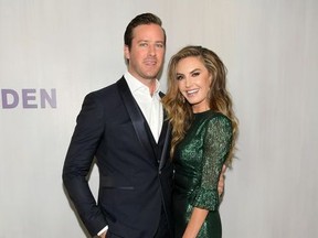 Armie Hammer (L), wearing Ferragamo, and Elizabeth Chambers, wearing The Vampires Wife at The Webster, attend the Hammer Museum 16th Annual Gala in the Garden with generous support from South Coast Plaza at the Hammer Museum on October 14, 2018 in Los Angeles, California.