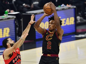 Cleveland Cavaliers guard Collin Sexton  shoots over Toronto Raptors guard Fred VanVleet earlier this season.