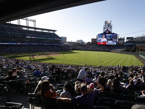A general view of the stadium as Charlie Blackmon #19 of the Colorado Rockies catches a fly ball to end the eighth inning against the Los Angeles Dodgers on Opening Day at Coors Field on April 1, 2021 in Denver, Colorado.