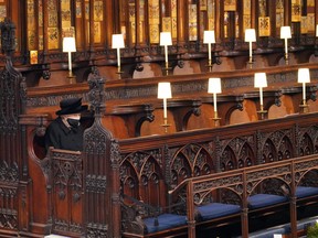 Queen Elizabeth takes her seat ahead of the funeral of her husband of 73 years, Prince Philip, Duke of Edinburgh, at St George's Chapel at Windsor Castle on April 17, 2021.