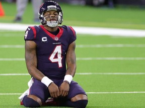 Deshaun Watson of the Houston Texans reacts to a play during a game against the Tennessee Titans at NRG Stadium on January 03, 2021 in Houston, Texas.