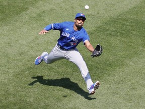 Marcus Semien  of the Toronto Blue Jays makes a running catch in short right field during the fifth inning against the New York Yankees at Yankee Stadium on April 04, 2021. The Blue Jays won 3-1.