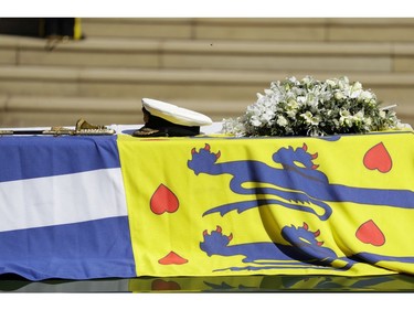 The Duke of Edinburgh's coffin, covered with His Royal Highness's Personal Standard, during the Ceremonial Procession during the funeral of Prince Philip, Duke of Edinburgh at Windsor Castle on April 17, 2021 in Windsor, England.