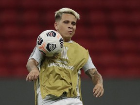 Santos' Yeferson Soteldo warms up before the Copa Libertadores match.