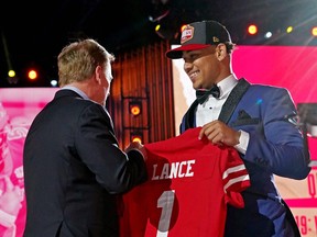 Trey Lance with NFL commissioner Roger Goodell after being selected by the San Francisco 49ers on Thursday night.