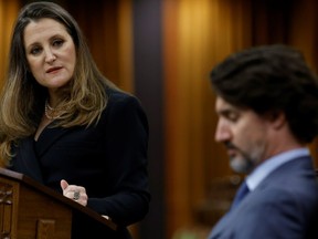 Finance Minister Chrystia Freeland looks at Prime Minister Justin Trudeau as she delivers her government's first budget in two years in the House of Commons in Ottawa, April 19, 2021.