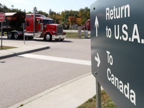 A truck leaves the Canada-United States border crossing at the Thousand Islands Bridge on Sept. 28, 2020.