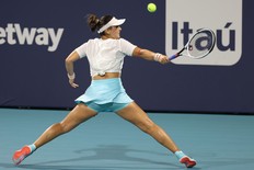 Bianca Andreescu of Canada hits a backhand against Sara Sorribes Tormo of Spain in a women's singles quarterfinal in the Miami Open at Hard Rock Stadium.