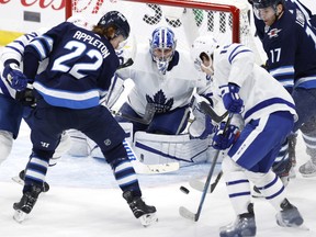 Jets' Mason Appleton  tries for a rebound in front of Maple Leafs goaltender Jack Campbell in the the second period at Bell MTS Place.