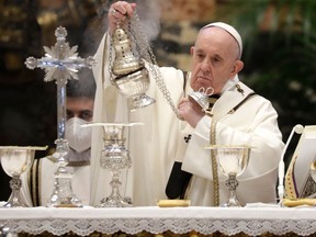 Pope Francis celebrates the Chrism Mass inside St. Peter's Basilica, where he also blesses a token amount of oil that will be used to administer the sacraments for the year at the Vatican, on April 1, 2021.