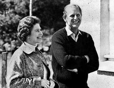In this file photo taken on Oct. 31, 1972, Queen Elizabeth II and Prince Philip, Duke of Edinburgh, pose at Balmoral Castle, near the village of Crathie in Aberdeenshire.