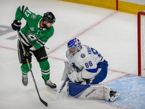 Lightning goaltender Andrei Vasilevskiy stops a shot by Stars right wing Alexander Radulov during Game 6 of the 2020 Stanley Cup Final at Rogers Place in Edmonton, Sept. 28, 2020.
