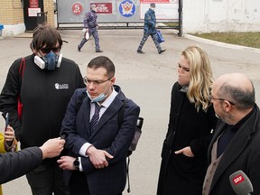 Doctors of jailed Kremlin critic Alexei Navalny Vsevolod Shurkhai, Yaroslav Ashikhmin, Anastasiya Vasilyeva and Alexei Erlikh speak to the media outside the IK-3 penal colony, which houses a hospital where Navalny was reportedly transferred, in Vladimir, Russia April 20, 2021.