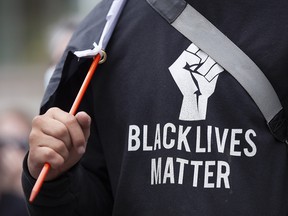 A Black Lives Matter activist attends a protest against police brutality on April 17, 2021 in Columbus, Ohio.