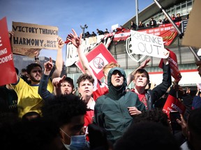 Arsenal fans protest against owner after failed launch of a European Super League - Emirates Stadium, London, Britain - April 23, 2021  Arsenal fans demonstrate at owner Stan Kroenke's involvement in the failed launch of a European Super League