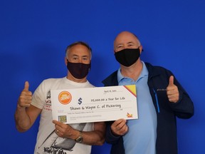Shawn Casey (left) and brother Wayne Casey split $500,000 in a lottery win.