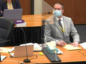 Former Minneapolis police officer Derek Chauvin attends the fourth day of his trial for second-degree murder, third-degree murder and second-degree manslaughter in the death of George Floyd in Minneapolis, Minnesota, April 1, 2021 in a still image from video.