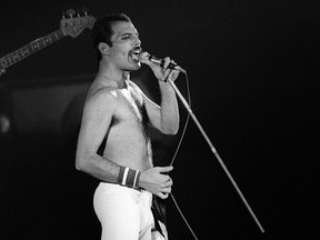 This file picture taken Sept. 18, 1984 shows rock star Freddy Mercury, lead singer of the rock group Queen, during a concert at the Palais Omnisports in Paris.