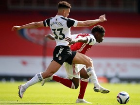 Antonee Robinson (left) and Fulham take on Chelsea this weekend