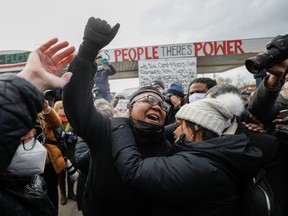 People react after the verdict in the trial of former Minneapolis police officer Derek Chauvin, found guilty of the death of George Floyd, at George Floyd Square in Minneapolis, Minn., April 20, 2021.