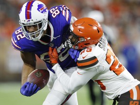 Tigie Sankoh, here tackling Bills' Logan Thomas during a 2018 pre-season game for the Cleveland Browns was the Argos' first pick in the 2021 CFL global draft.