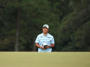 Hideki Matsuyama of Japan walks to the 18th green during the third round of the Masters at Augusta National Golf Club on April 10, 2021 in Augusta, Ga.