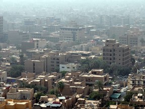 This skyline of downtown Baghdad with rooftops and terraces is a very typical urban view seen all over the Middle East.