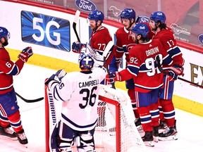 Montreal Canadiens right wing Josh Anderson (17) celebrates his goal against Toronto Maple Leafs goaltender Jack Campbell (36) with teammates during the second period at Bell Centre April 12, 2021.