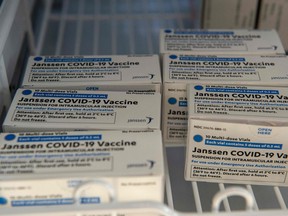 In this file photo taken on March 4, 2021 Johnson & Johnson COVID-19 Janssen Vaccine boxes sit in a locked refrigerator at the U.S. Department of Veterans Affairs' VA Boston Healthcare System's Jamaica Plain Medical Center in Boston, Mass.