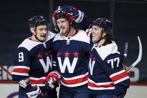 Newly acuired winger Anthony Mantha (centre) has been red-hot since leaving Detroit for Washington. It helps to have some talented teammates. GETTY IMAGES