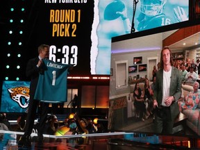 NFL commissioner Roger Goodell announces the Jacksonville Jaguars’ selection of quarterback Trevor Lawrence with the first pick of the 2021 NFL draft at the Great Lakes Science Center in Cleveland, Ohio, last night. Getty Images