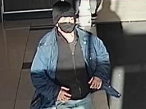 An image released by Toronto Police of a man sought in a voyeurism investigation at Crossways Plaza on March 22, 2021.
