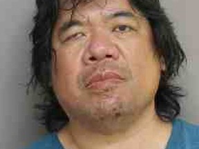 Jonathan Wong, 50, is charged in a voyeurism investigation.