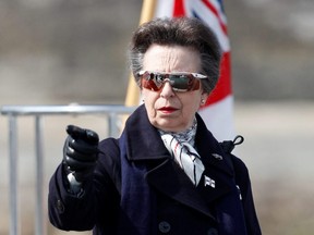 Britain's Princess Anne gestures as she visits the Royal Yacht Squadron, after Prince Philip, husband of Queen Elizabeth, died at the age of 99, in Cowes on the Isle of Wight, Wednesday, April 14, 2021.