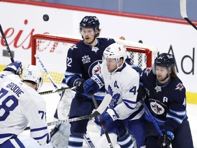 Maple Leafs' Morgan Rielly (third from left) has climbed into the top 10 among most games played by a Leafs defenceman.