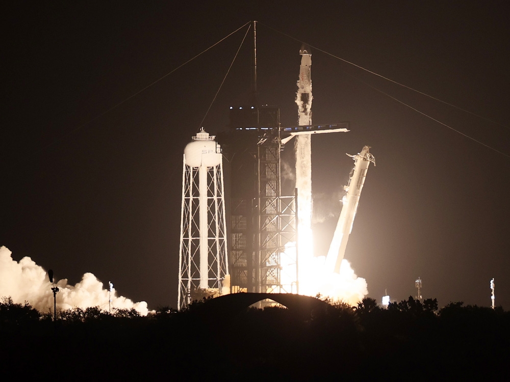 SpaceX rocket launches astronauts on NASA mission to space station ...